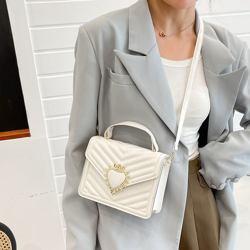 Discover athé's Luxe Small Square Handbag, a masterpiece of South Korean craftsmanship in premium PU, blending elegance with functionality for the discerning style connoisseur.