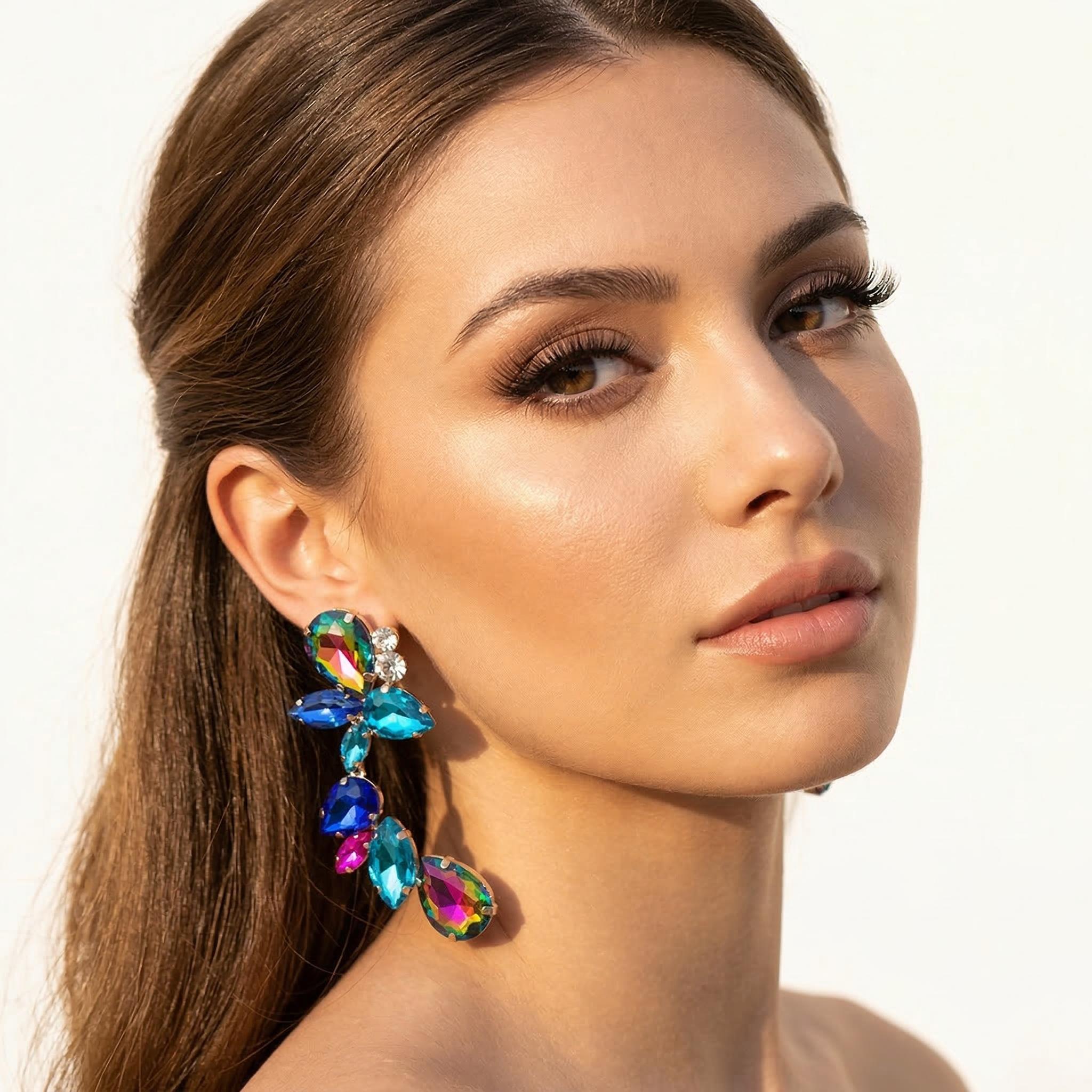 Discover athé's Floral Dangle Rhinestone Earrings, handcrafted in South Korea, where exquisite craftsmanship meets timeless elegance for a statement of luxury.