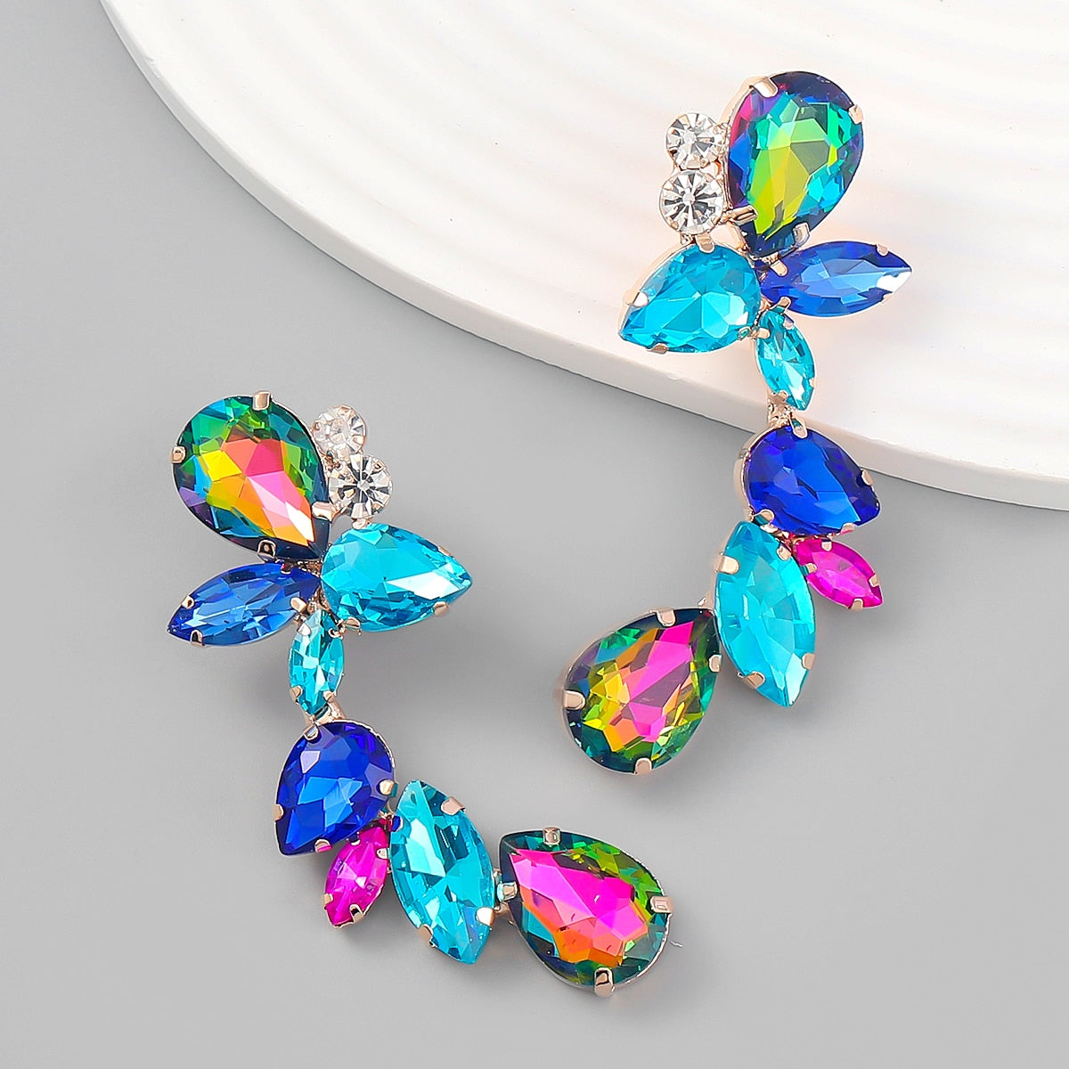 Discover athé's Floral Dangle Rhinestone Earrings, exquisitely crafted in South Korea, blending luxurious materials with timeless elegance for every sophisticated occasion.