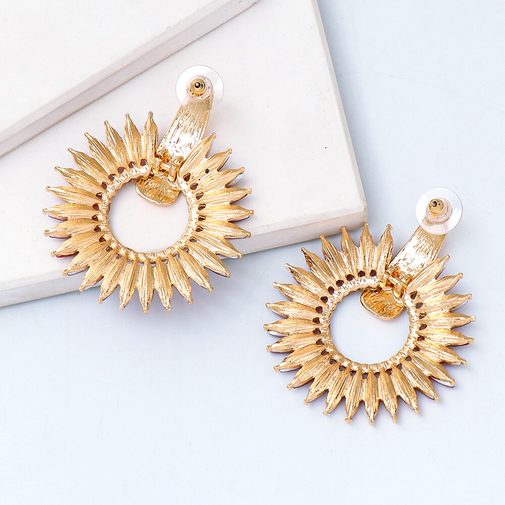 Discover athé's Exquisite Bohemian Crystal Hoop Earrings, handcrafted in South Korea with premium materials, embodying timeless elegance and vibrant artistry for every occasion.