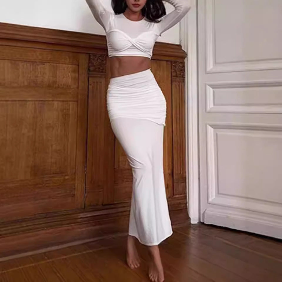 Discover the ULZZANG BELLA Luxury Fish Tail Skirt and Long Sleeved Crop Top Set, crafted in South Korea from premium polyester for an elegant silhouette that embodies sophistication.
