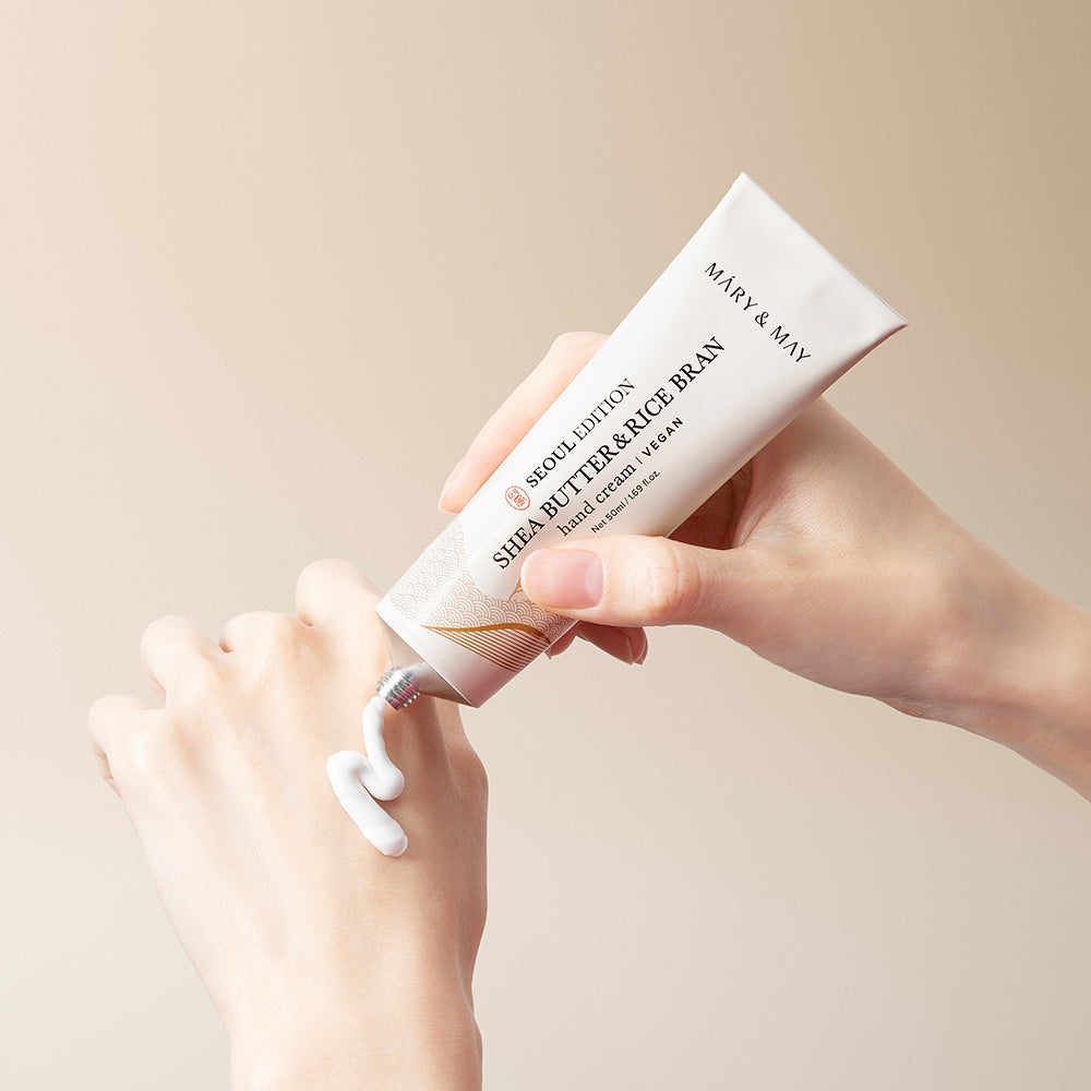 Indulge in the exquisite Mary&May Shea Butter & Rice Bran Hand Cream, crafted in South Korea for unparalleled hydration and luxury, embodying clean beauty sophistication.