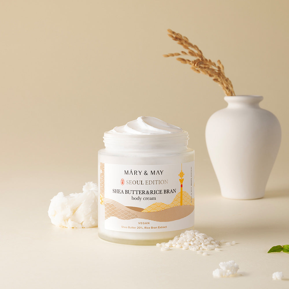 Indulge in the luxurious Mary&May Shea Butter & Rice Bran Body Cream, crafted in South Korea to nourish and elevate your skincare ritual with its exquisite formulation.