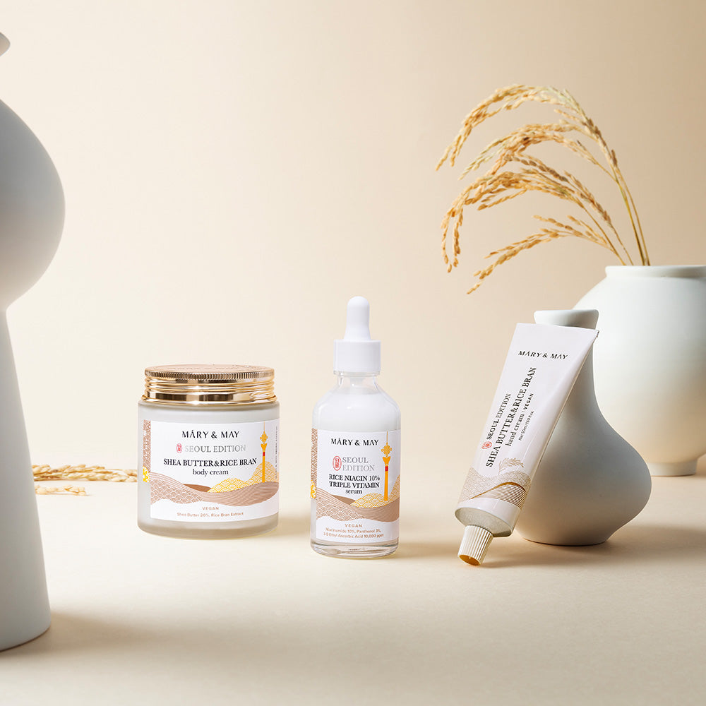 Indulge in the luxurious Mary&May Shea Butter & Rice Bran Body Cream, crafted in South Korea to nourish and elevate your skin's radiance with exquisite ingredients.