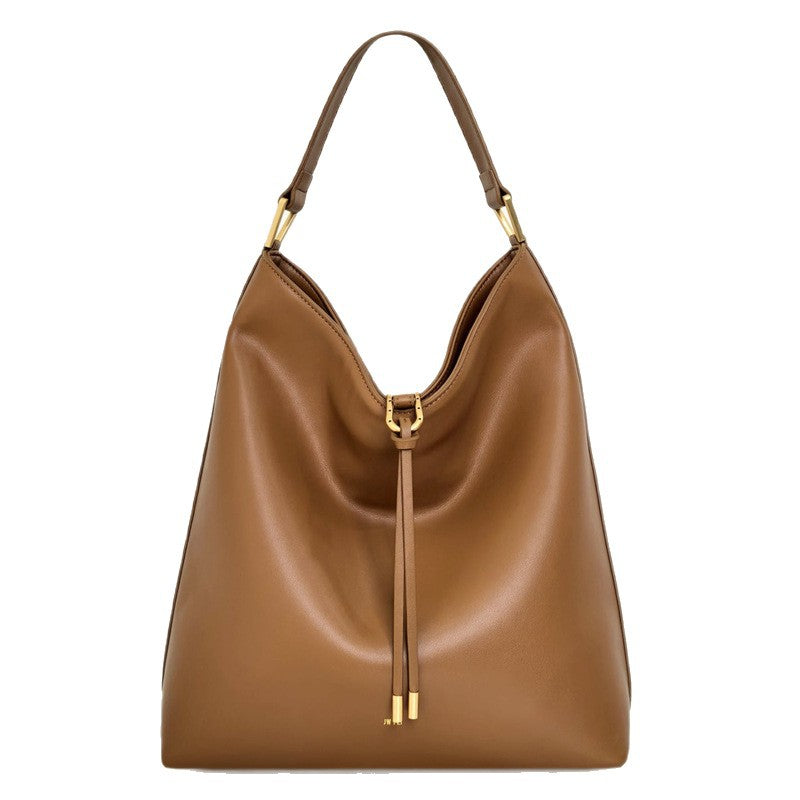 Discover athé's Velvet Suede Crossbody Tote Bag, a masterpiece of South Korean craftsmanship, blending luxurious materials with timeless elegance for the discerning individual.
