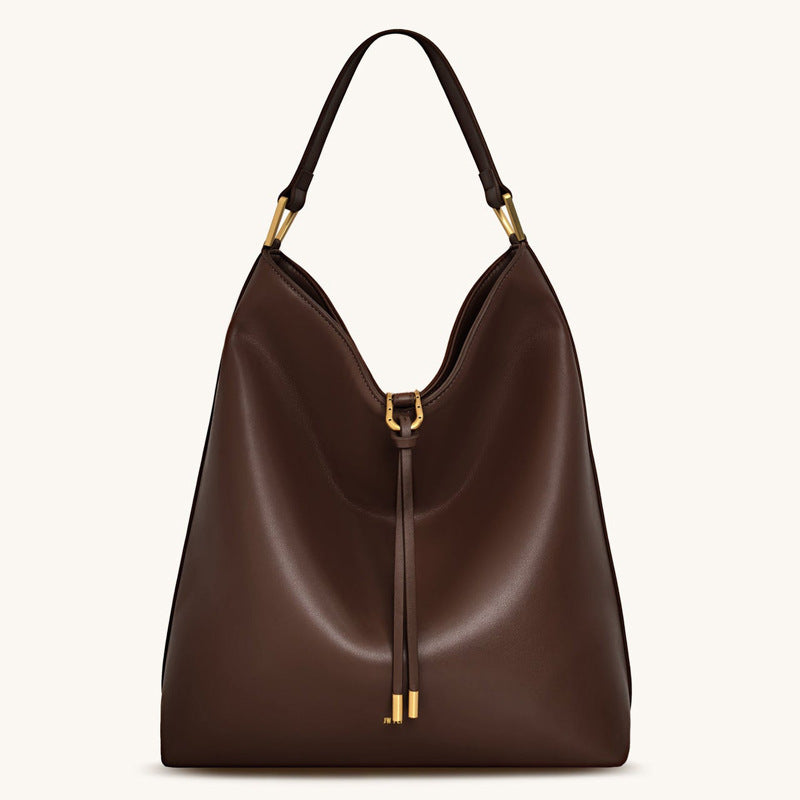 Discover athé's Velvet Suede Crossbody Tote Bag, a masterpiece of South Korean craftsmanship, blending luxurious materials with effortless elegance for the discerning individual.