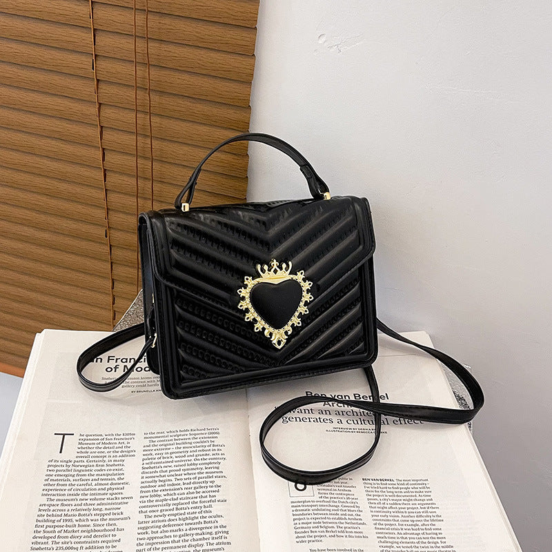 Discover athé's Luxe Small Square Handbag, expertly crafted in South Korea from premium materials, blending timeless elegance with modern sophistication for the discerning individual.